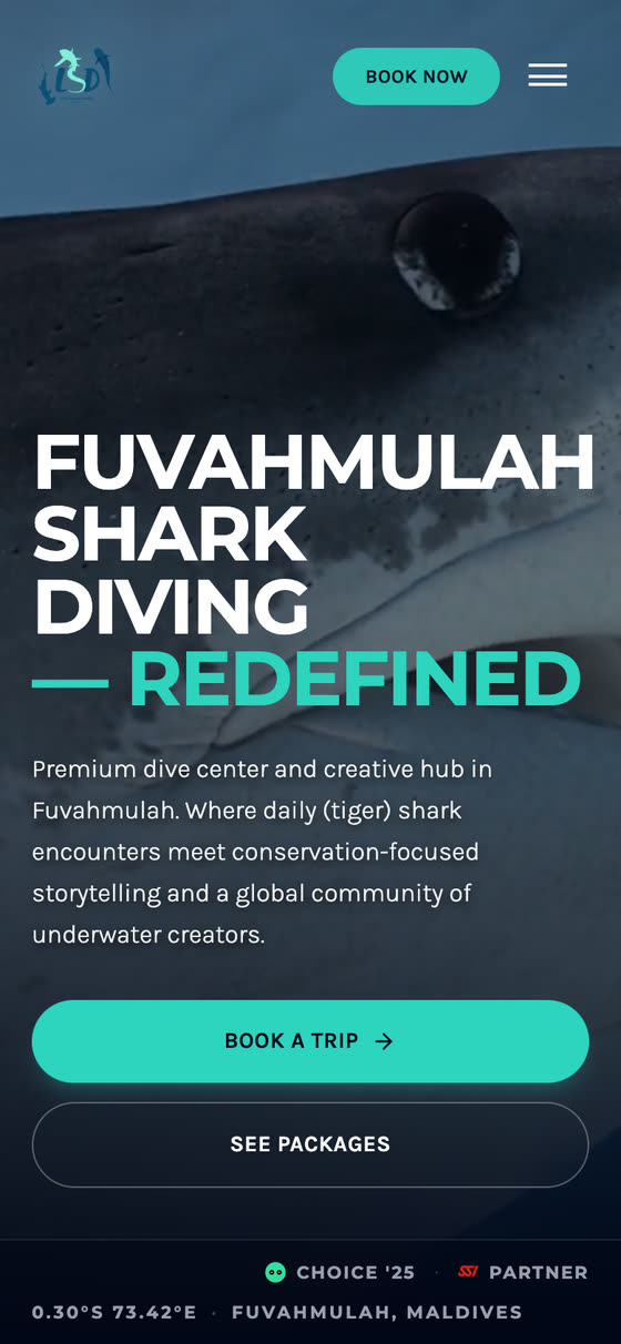 Liquid Shark Divers Fuvahmulah on a phone